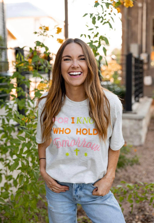 Who Holds Tomorrow Tee
