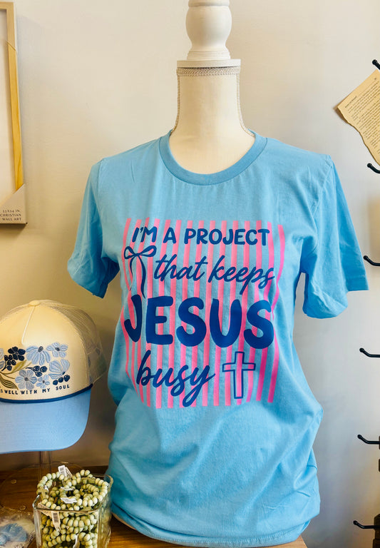 I'm The Project That Keeps Jesus Busy Tee